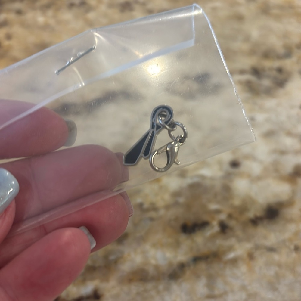 Supernatural Tie Charm